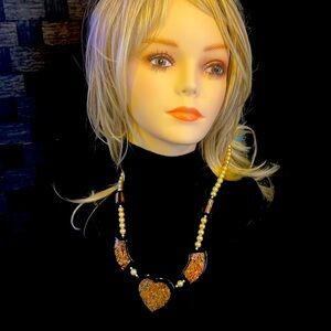 Vintage Plastic Heart Necklace with Beans . String with Screw together clasp.